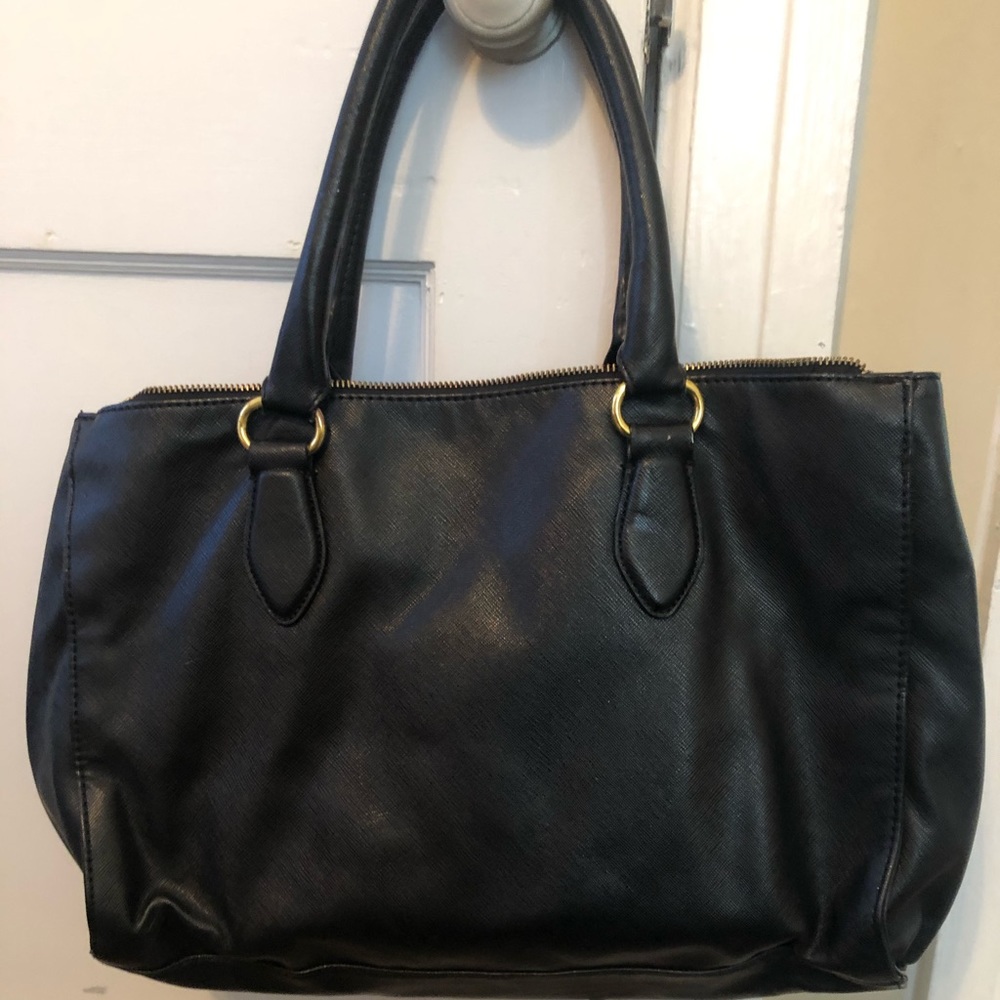 Black purse by Co-Lab